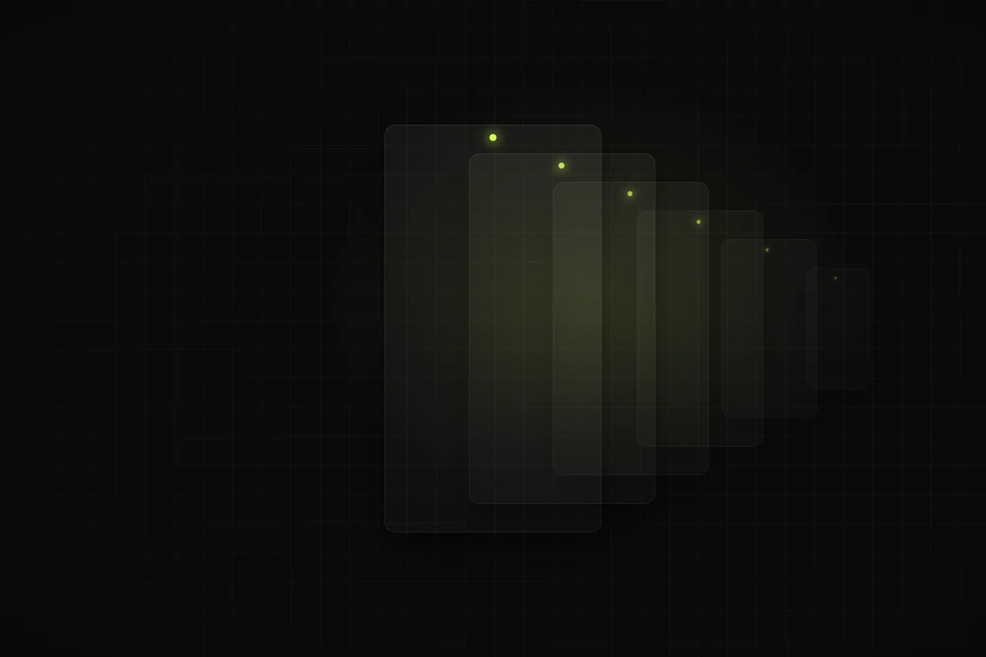 Work stations receding down a dark hall, each lit by its own lamp